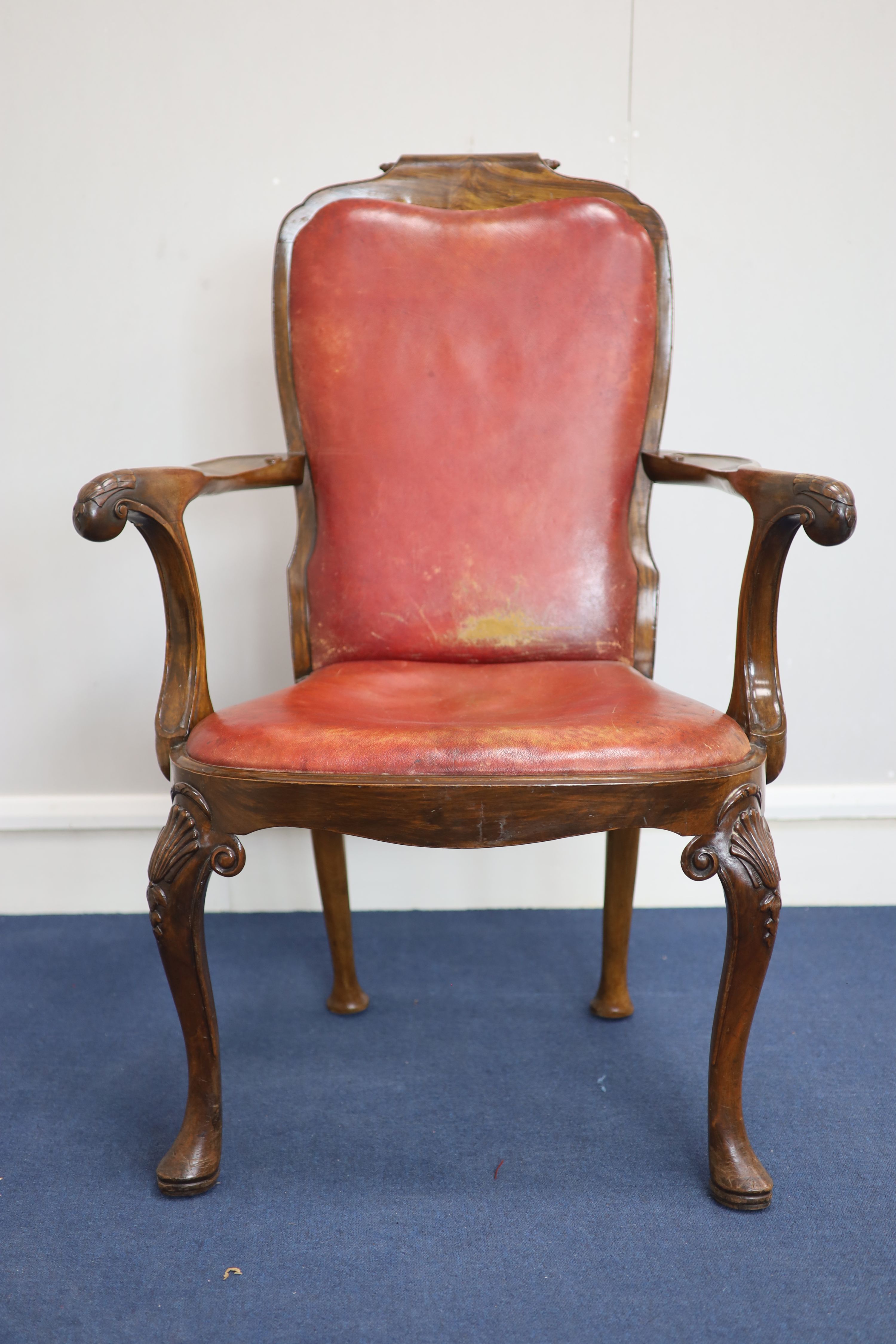 A set of four George I style walnut armchairs, first quarter 20th century,